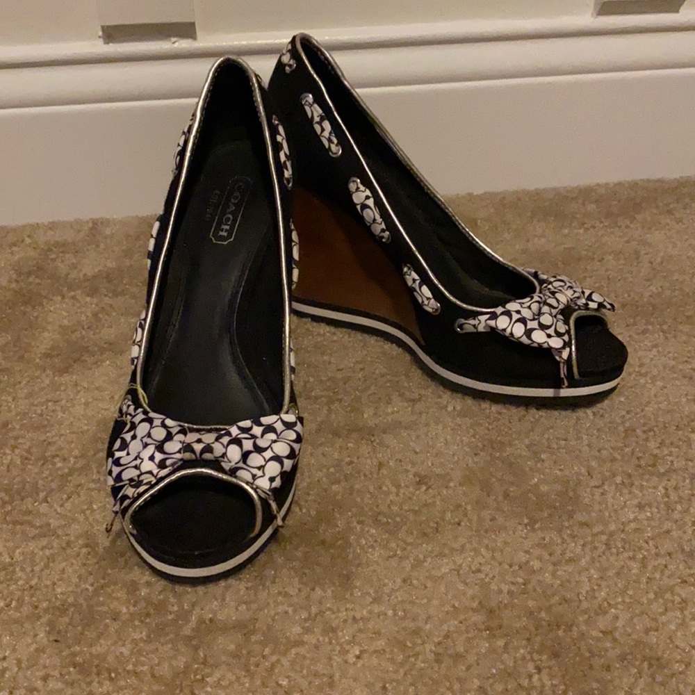 Black and white Coach wedges with peep toe